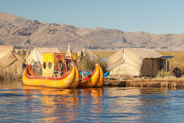 Reed boat on Island of Uros lake Titicaca Peru and Bolivia. - obrazy, fototapety, plakaty