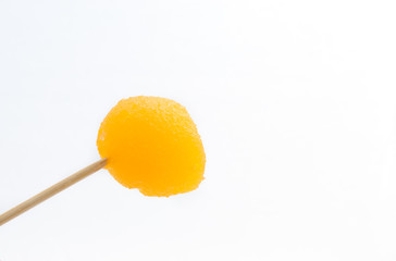 closeup egg yoke fudge balls cooked in syrup (Thong Yot)