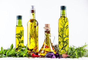 Obraz na płótnie Canvas Homemade oil with herbs