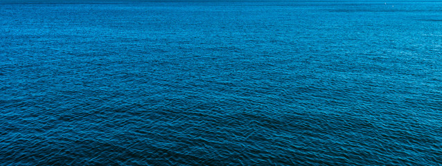Blue sea surface with waves. Background, water texture