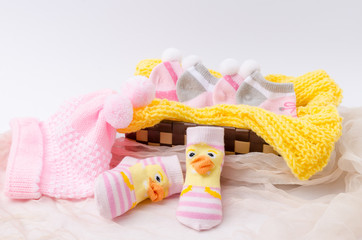 Pink knit hat and socks gift set for a newborn baby girl