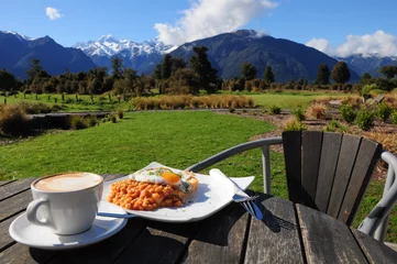 Tuinposter Breakfast with beautiful view of mountain © popkrub