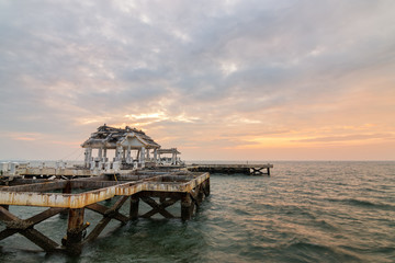 Old Pavilion in the sea at sunset