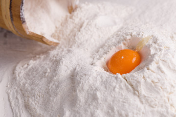 Obraz na płótnie Canvas flour and yolk, backing background