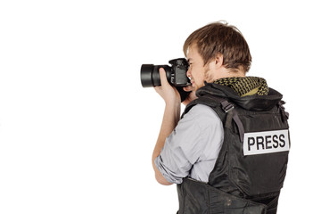 press photographer wears a protective vest and takes photos with