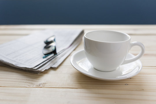 coffee cup and newspaper