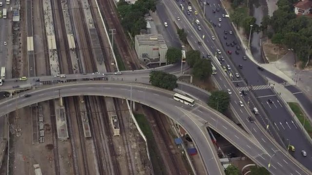 Aerial footage of train tracks and highway