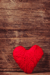 Fototapeta na wymiar Red thread heart