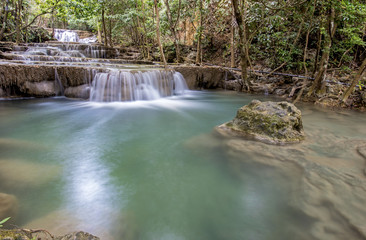 tropical waterfall in deep forest of Kanchanaburi province, Thailand