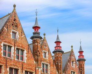Obraz premium Bruges historical pitched roofs and spiers