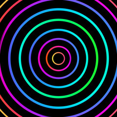 Multicolored graduated circles on black.