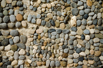 Natural pebble texture for background. Toned