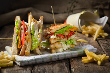 Concept of club sandwich on wooden table