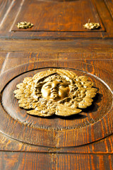 gold face  house  door     in italy  lombardy           closed
