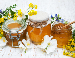 Obraz na płótnie Canvas Honey and wild flowers