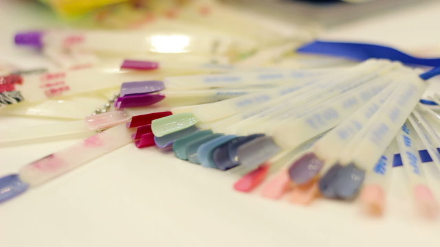 Selecting a manicure example in a beauty salon