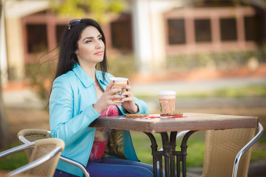 Beautiful Middle Age Woman Drinking Coffe In Cafe  Outdoor