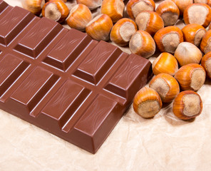 Chocolate with hazelnuts closeup.