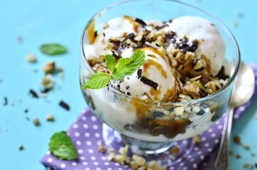 Vanilla ice cream with caramel and walnuts.