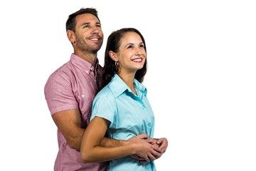 Obraz premium Smiling couple looking up