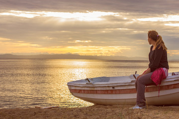 Young Woman Relaxing on Beach