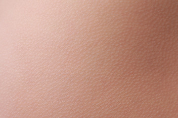 close up view of a human skin (woman body)