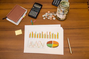 Dollar bills and graphs for finance concept