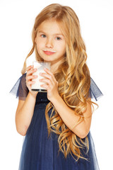 Beautiful girl with a glass of milk