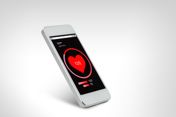 white smarthphone with red heart icon screen