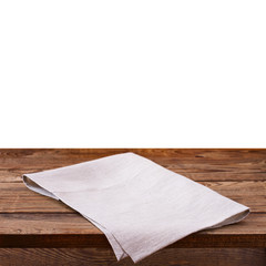 Empty wooden deck table with tablecloth isolated.