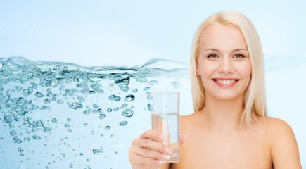 young smiling woman with glass of water