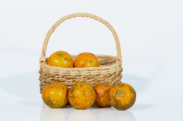 tangerines in a beautiful basket