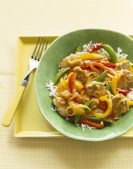 Stir fry chicken with rice and vegetables. Asian food.