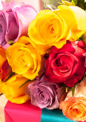 Fototapeta na wymiar Fresh bunch of colorful roses for Valentines Day
