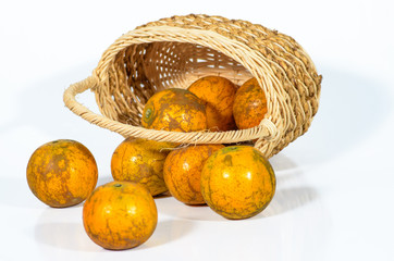 tangerines in a beautiful basket