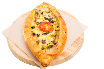 Delicious pie with tomatoes and cheese.