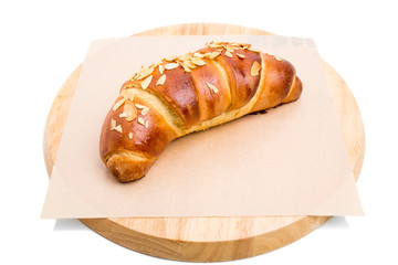 Delicious croissant with grated almonds.