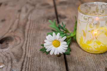 Candle and flower