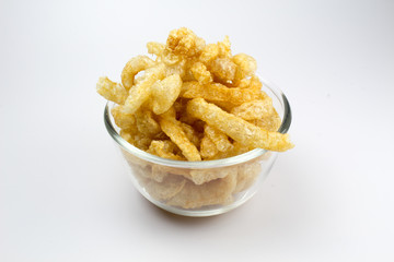 Pork Crackling, Pork Rind, Pork Scratchings or Pork Snack in bow