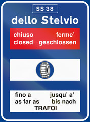 Road sign used in Italy - Road conditions to dello Stelvio, with the words closed and as far as in different languages