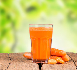 Fresh juice,carrot on wooden table