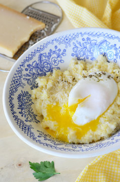 Millet Porridge with Poached Egg and Grated Cheese