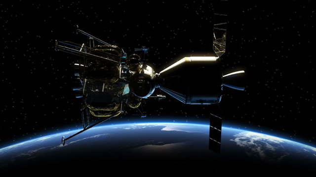 Undocking Of The Space Station In The Rays Of Sun Over Earth