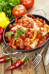 Chicken in a sauce of tomato and pepper