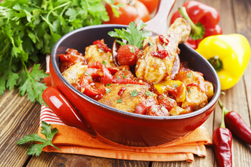 Chicken in a sauce of tomato and pepper