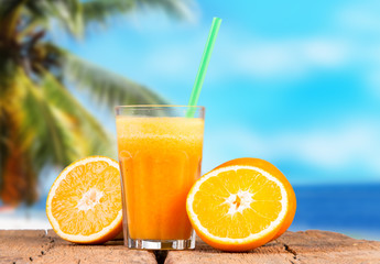 Fresh orange juice on woden table 