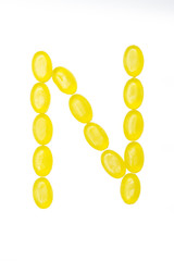 N letter made of colors candy