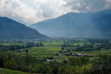 Fototapeta premium Lago di Mezzola Lake landscape. Water and mountains. Lombardy, Italy, Europe.