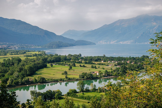Lago di Mezzola Lake landscape. Water and mountains. Lombardy, Italy, Europe.