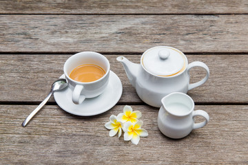 Cup of coffee with on wooden tables